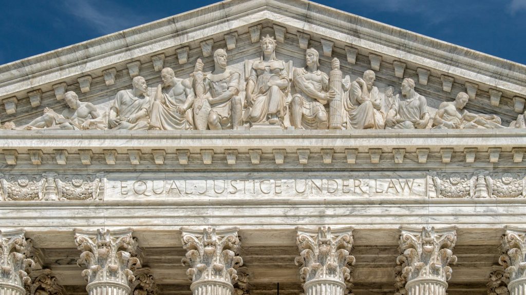 Washington DC Supreme Court facade equal justice under the law on sunny day