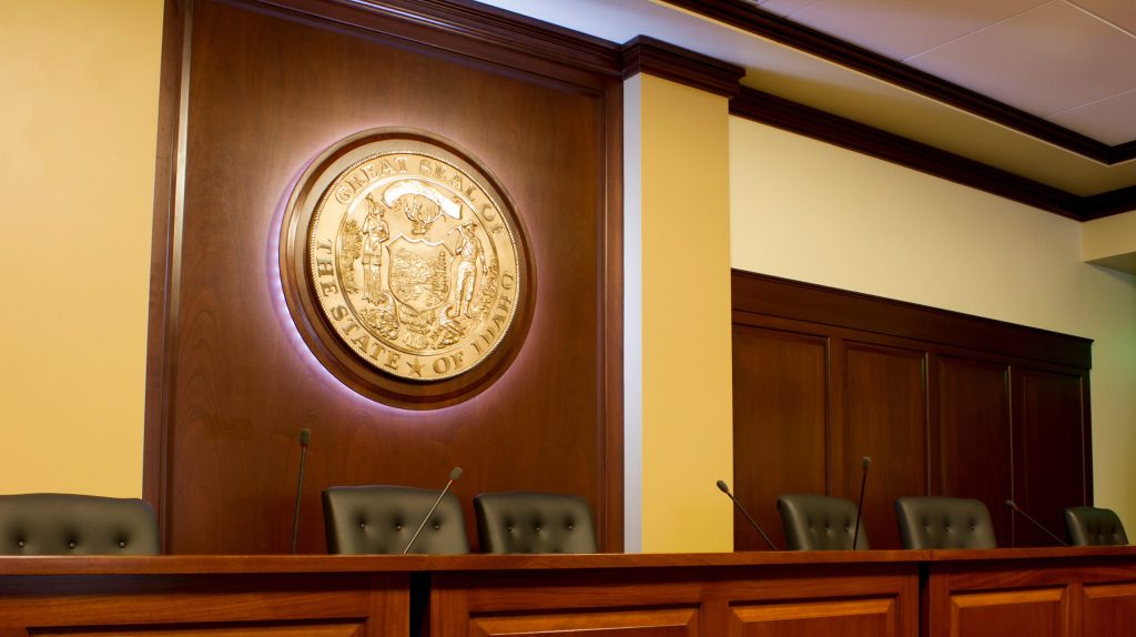 Row of seats behind a desk in the the idaho capital building